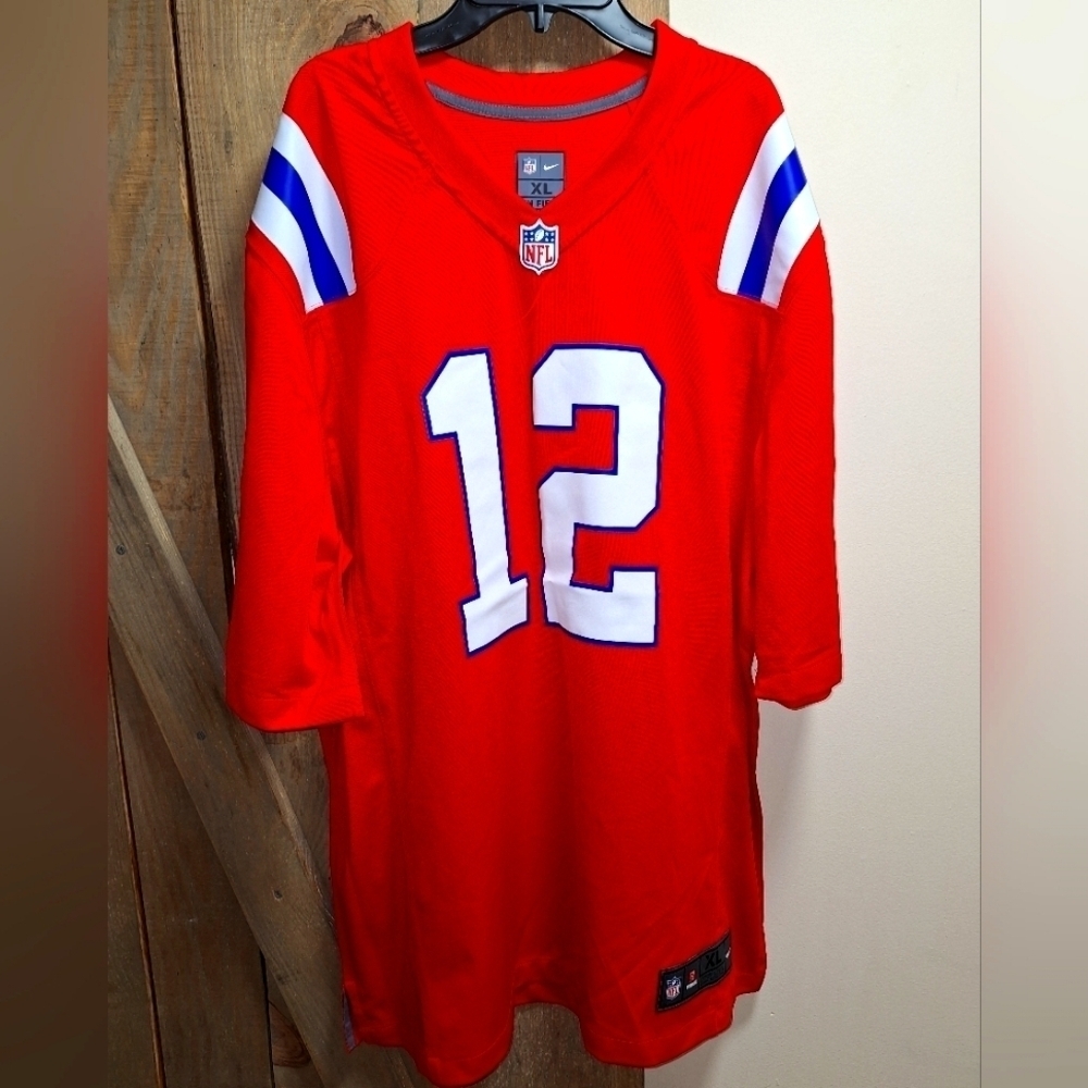 A Nike official NFL #12 Brady jersey in a mens XL and medium. NWOT.